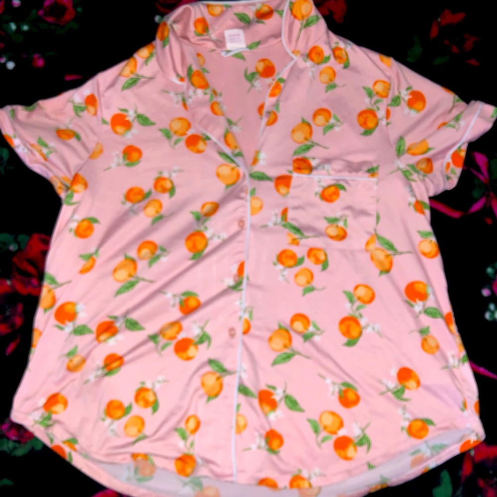 I am selling this light pink with oranges two piece sleep outfit